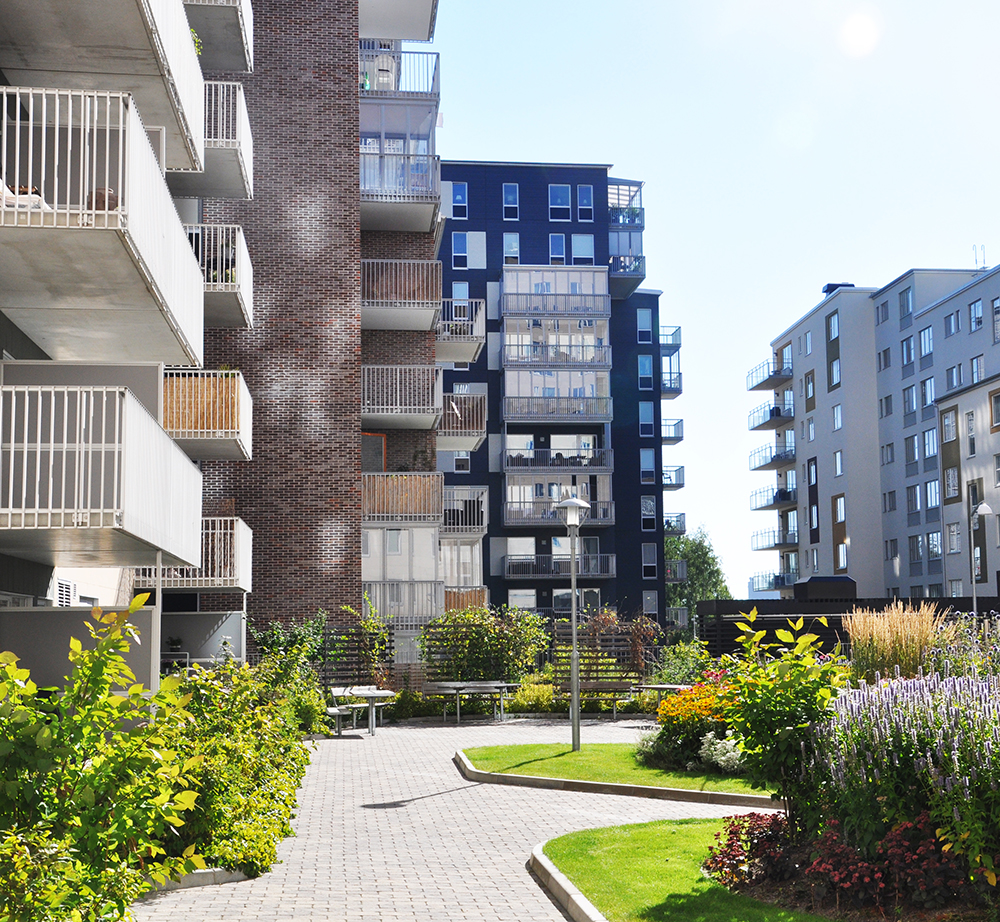 Flerbostadshus med grönområde